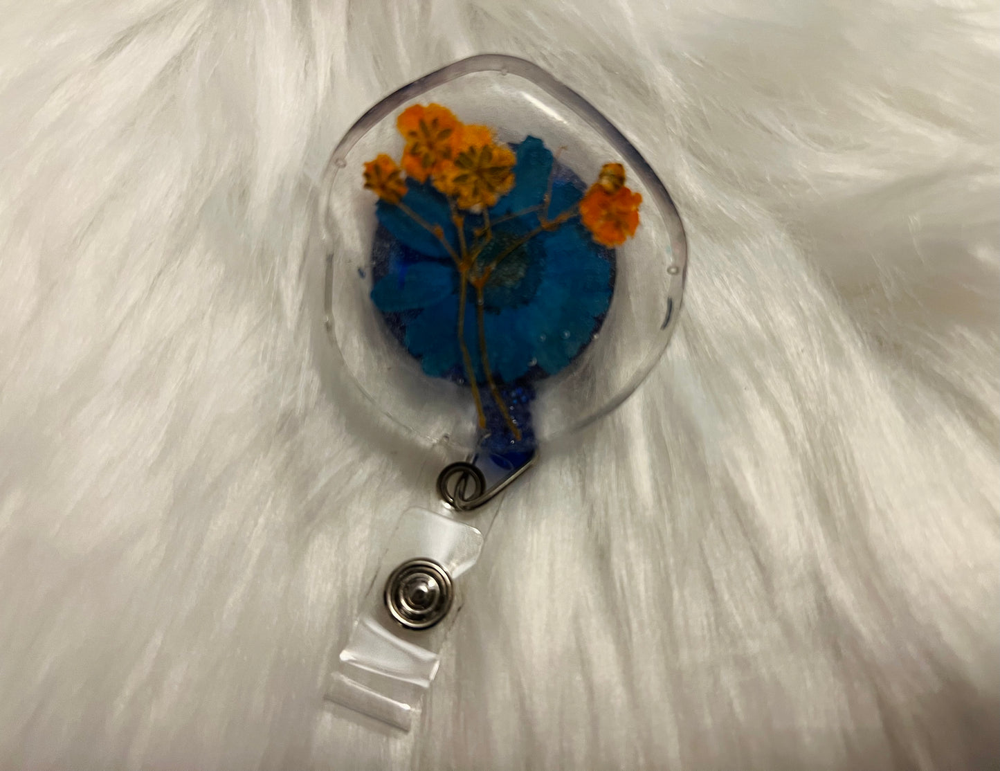 Orange and Blue Flowers Badge Reel